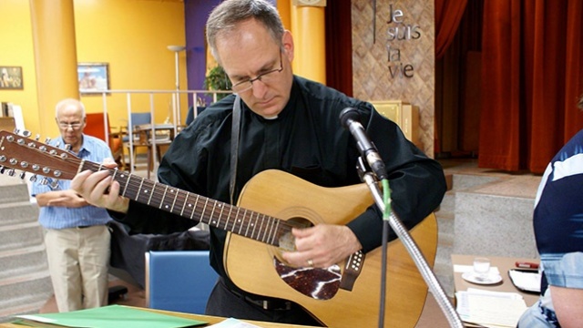 Mgr Faubert guitar cropped