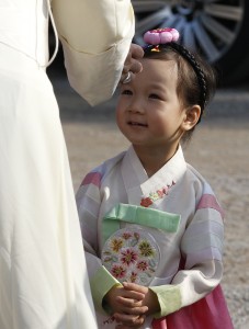 Pope Francis blesses girl after praying at the birthplace St. Andrew Kim Taegon